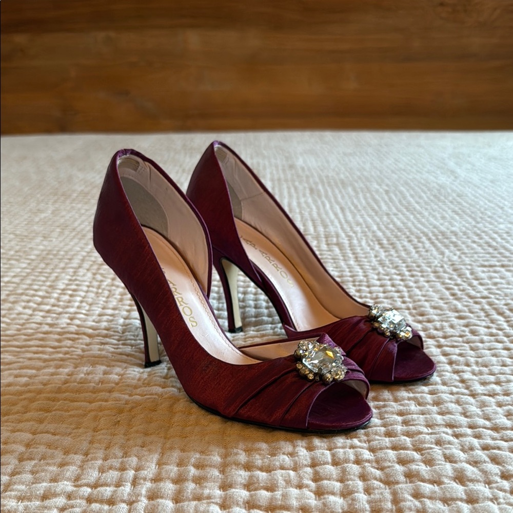 Purple satin heels with jewel embellishment